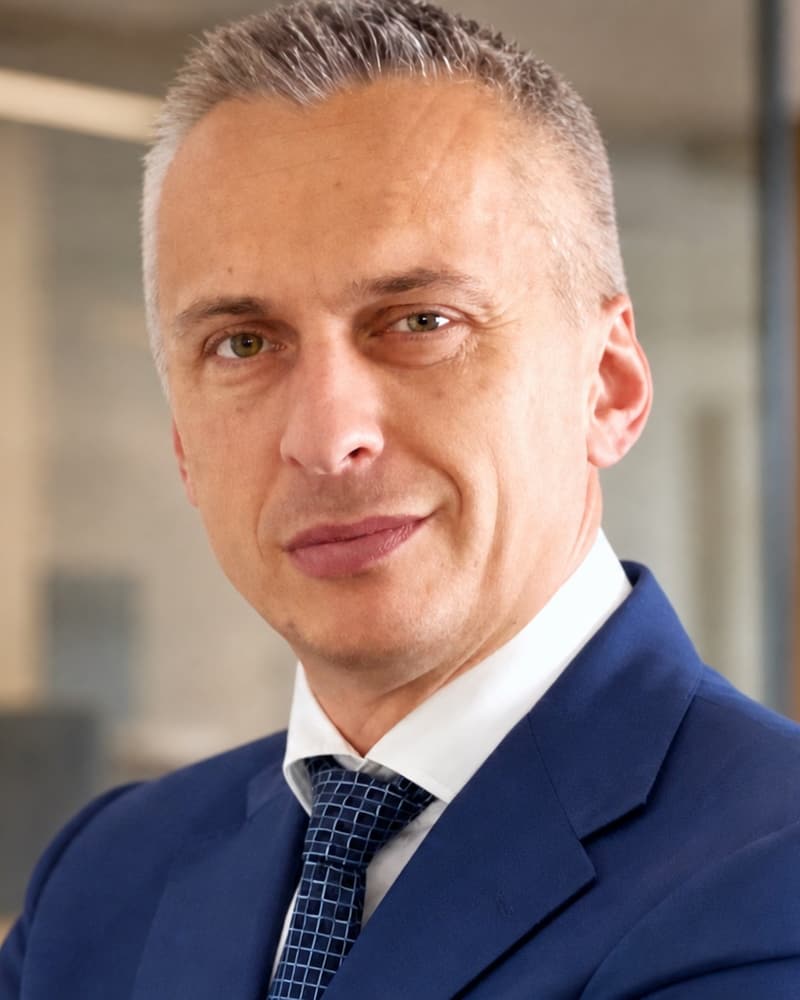 Stan Tscherenkow in a corporate office setting